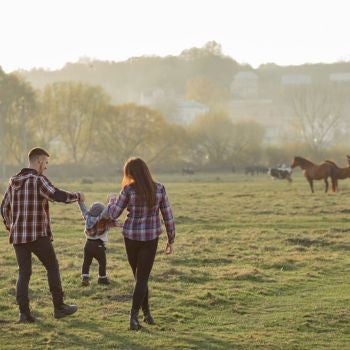 family walking in field