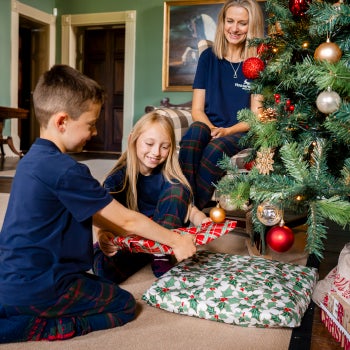 A family in matching Horseware Christmas pyjamas