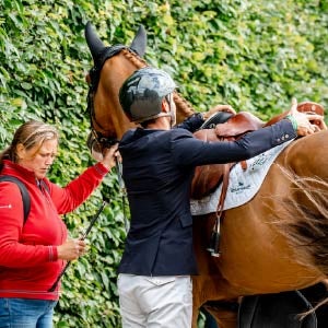 Horse, rider and groom at an event 