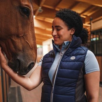 woman smiling with horse