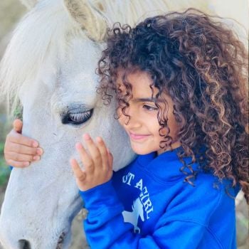 pony and girl together